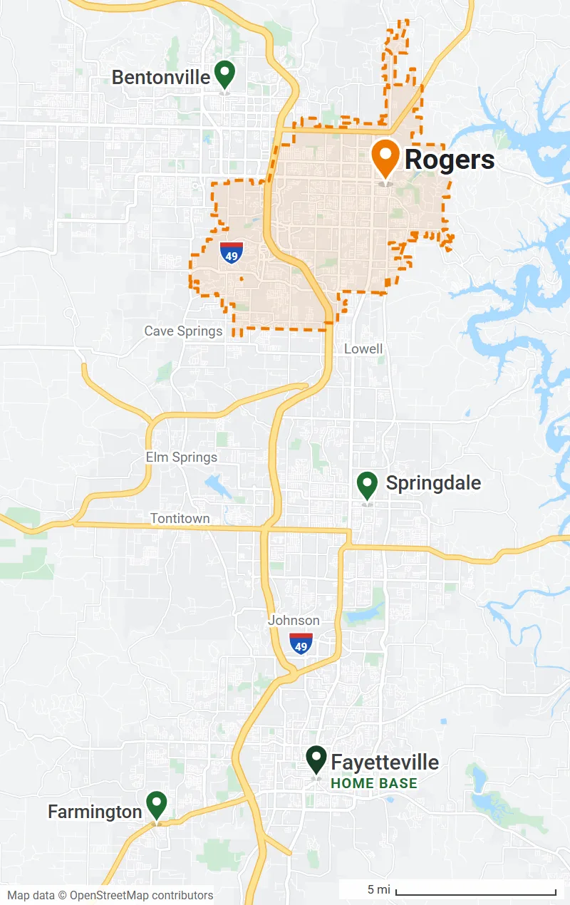 Map of Northwest Arkansas with the Rogers city limits outlined in orange and pins on Bentonville, Springdale, Fayetteville (home base) and Farmington